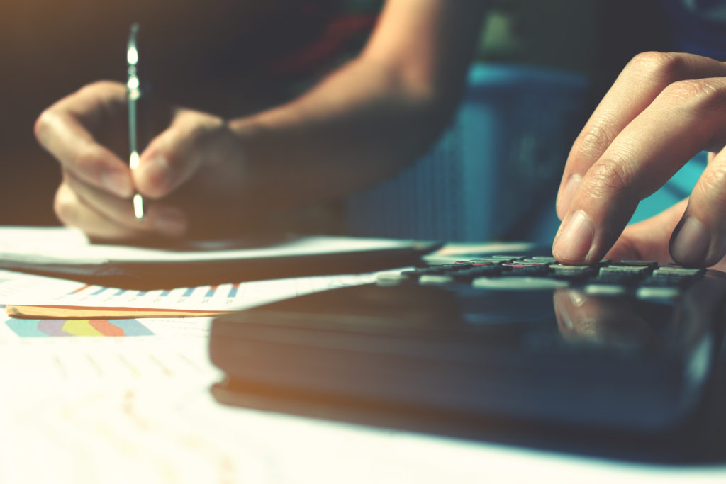 woman using a calculator